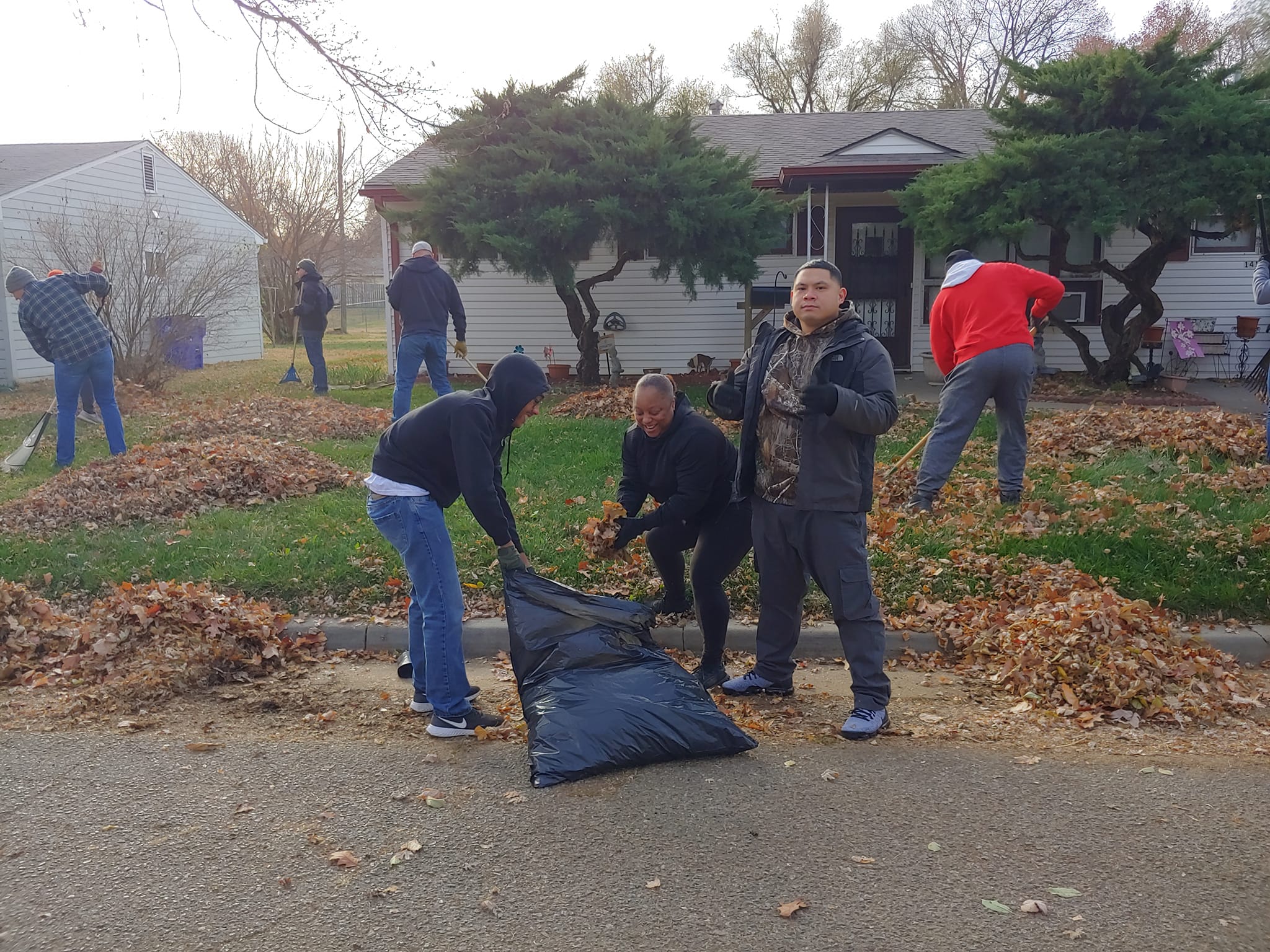 Volunteers come out to rake leaves and care for our elderly neighbors.